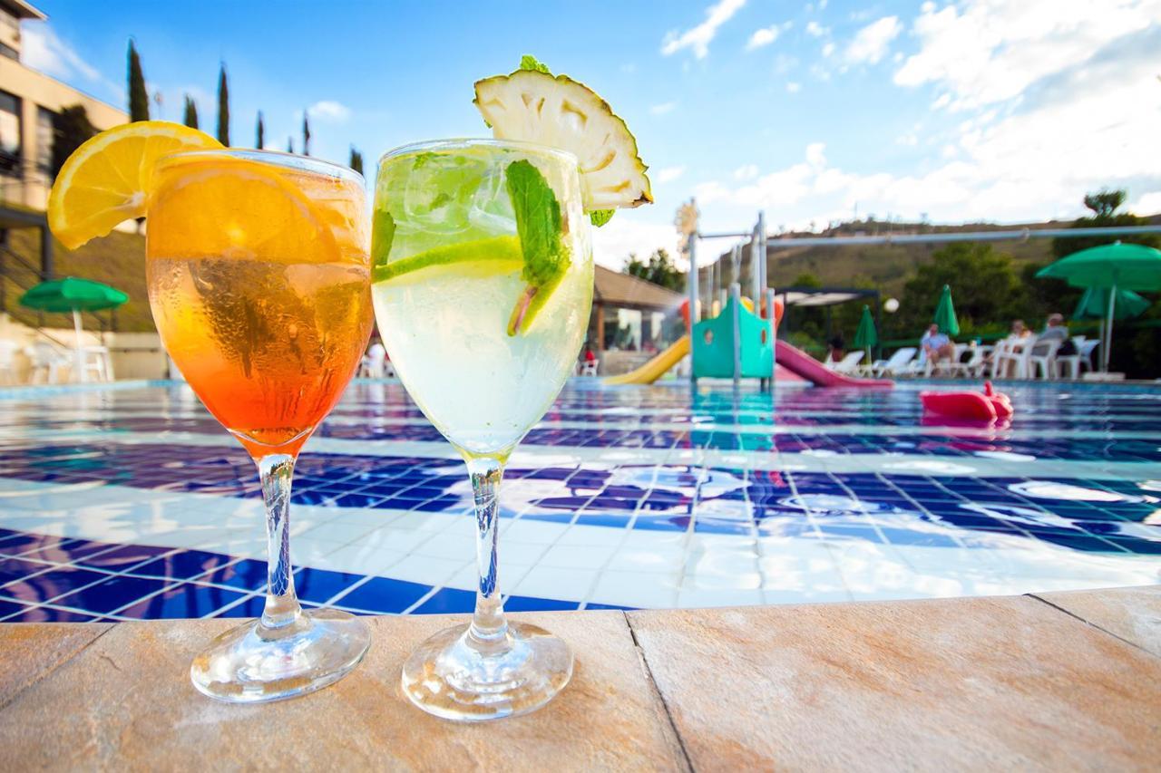 Hotel Golden Park All Inclusive Pocos De Caldas By Nacional Inn Exterior foto Two Aperol Spritz cocktails